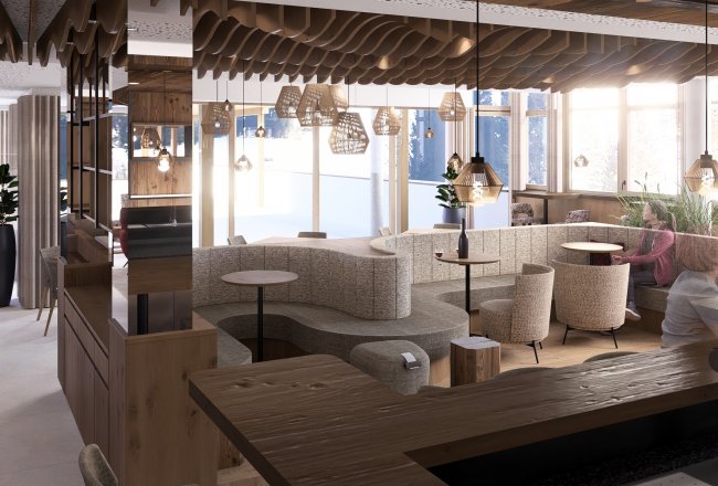 Gemütliche Tische rund um die Bar