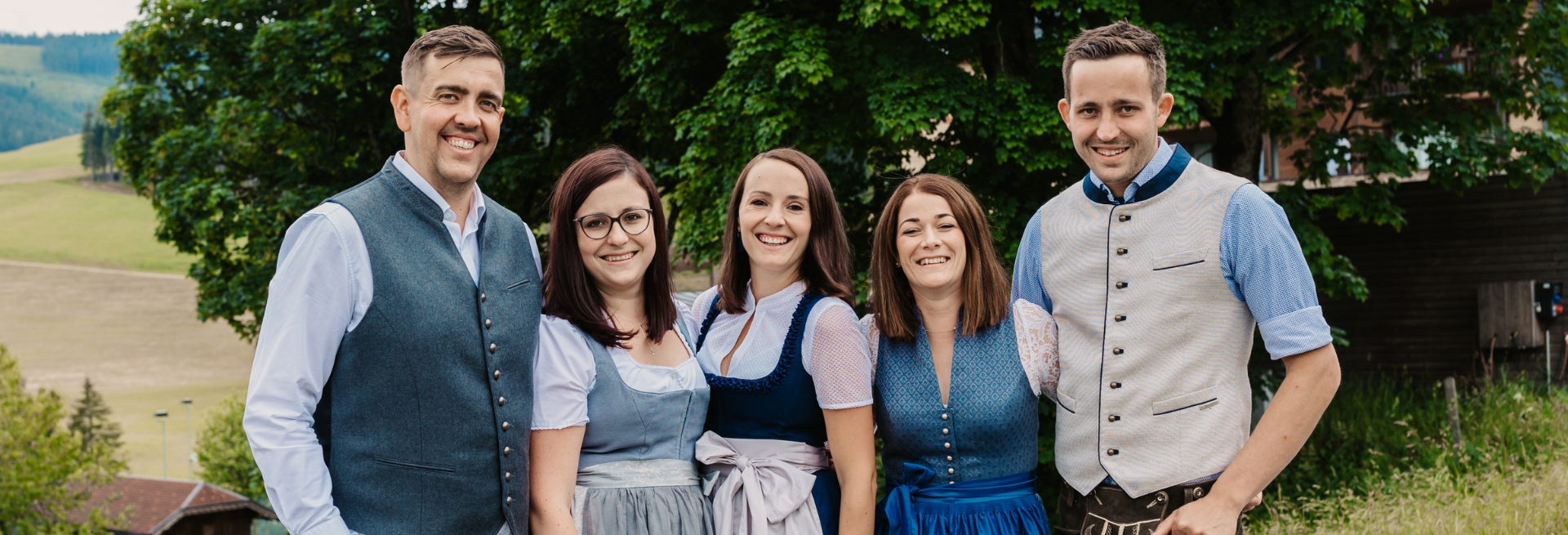 The Reiter family and the Bischofsmütze with the hotel in the background