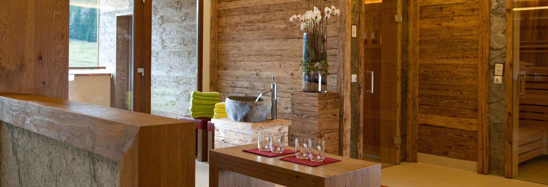 Saunas, tea bar and balcony with a panoramic view in our sauna area in the Hotel Neubergerhof, Filzmoos